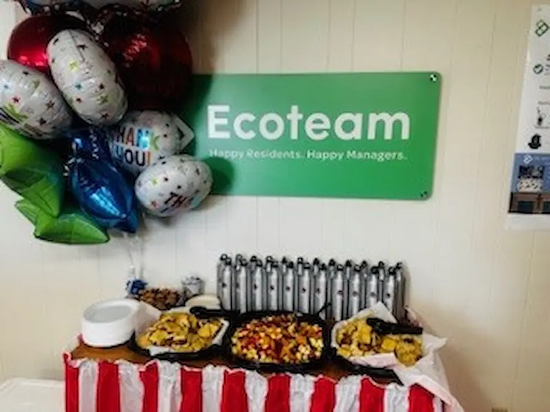 Ecoteam appreciation event with food and balloons.